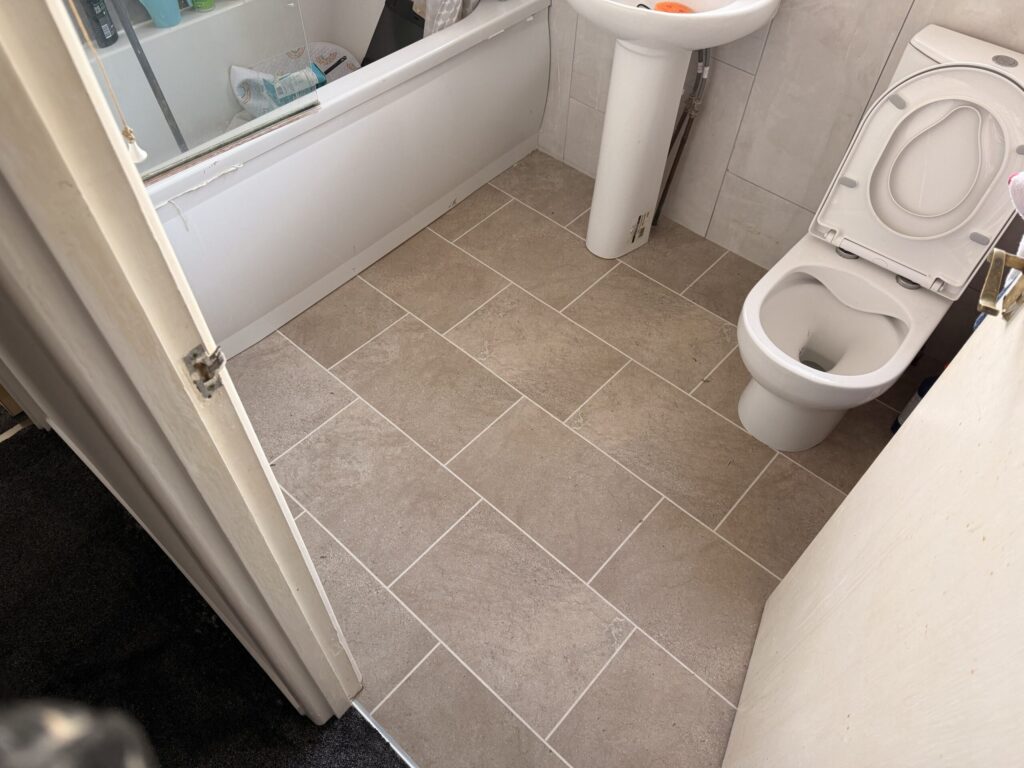 After: Bathroom vinyl flooring